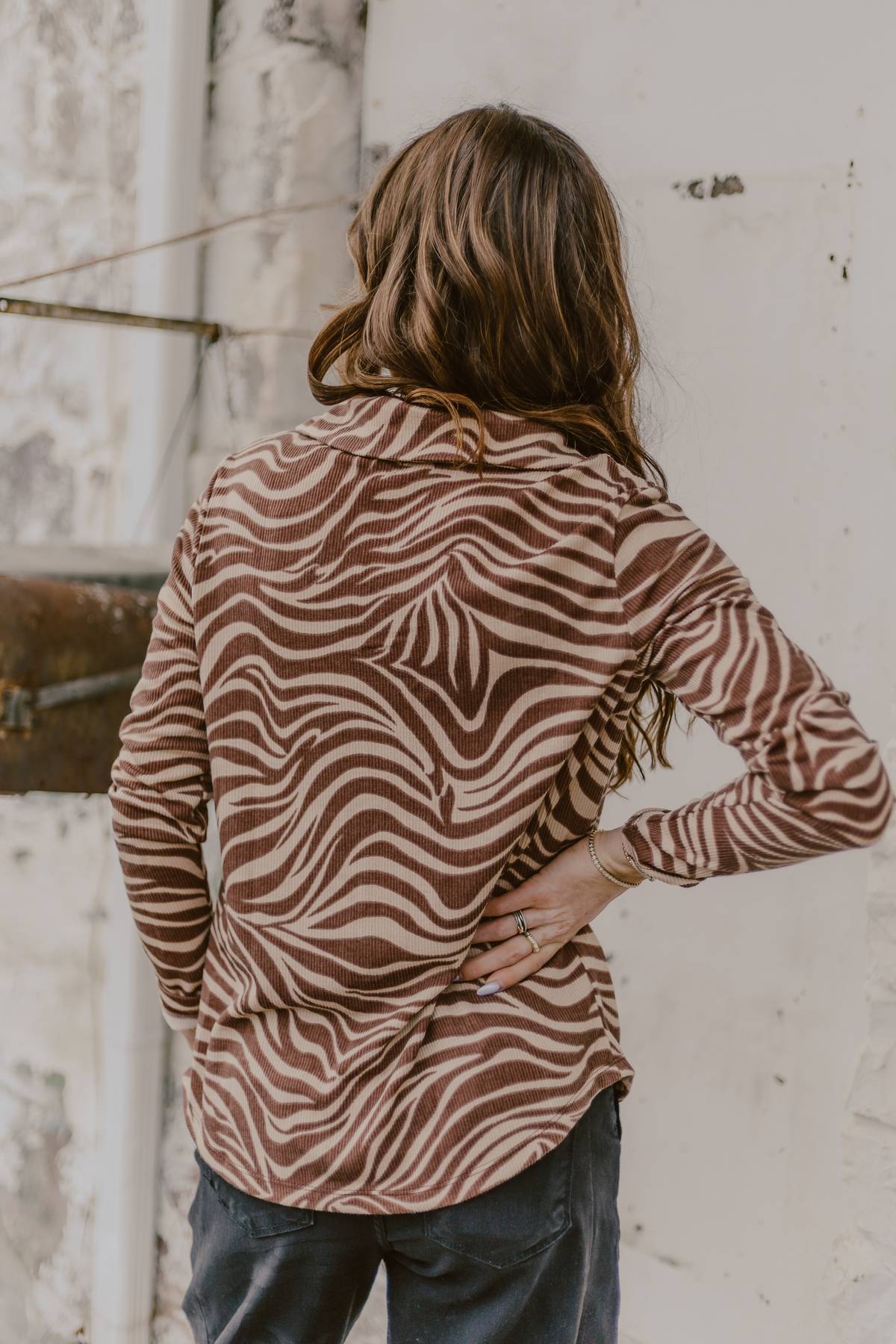 back of brown zebra pattern shirt