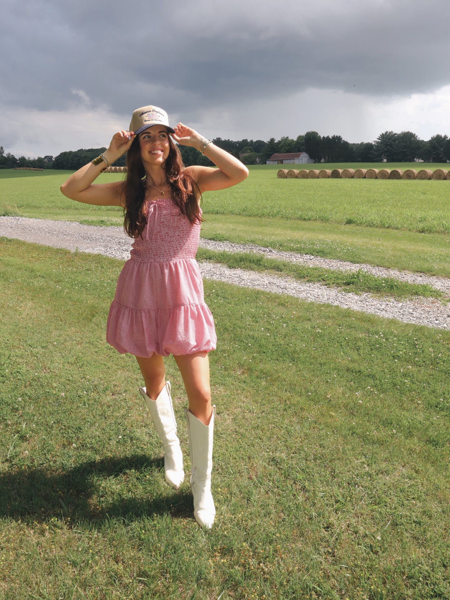 Red Gingham bubble hem romper. Thats strapless and styled in the summer