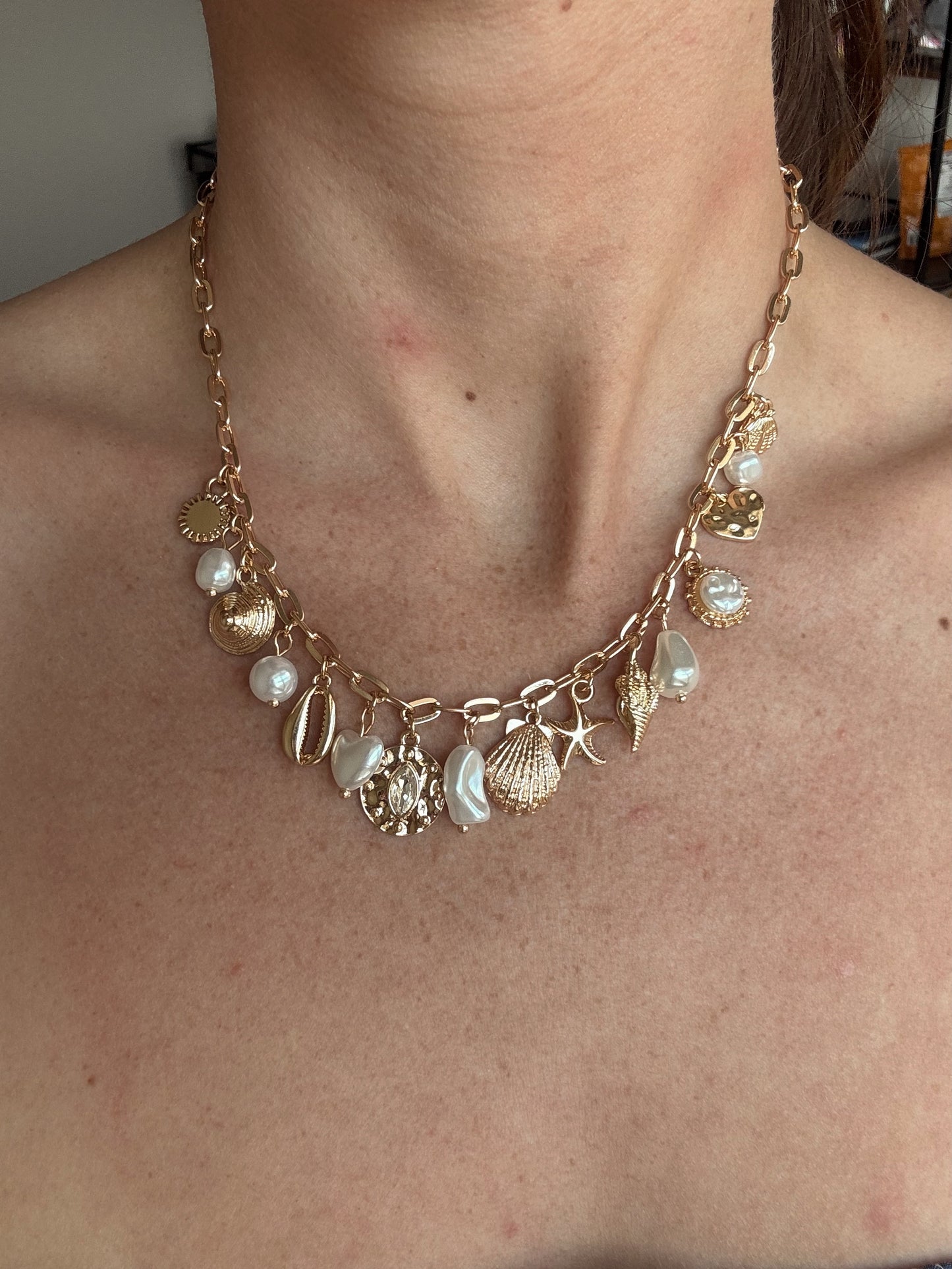 Gold Charm necklace for the beach with pearls and sea shells