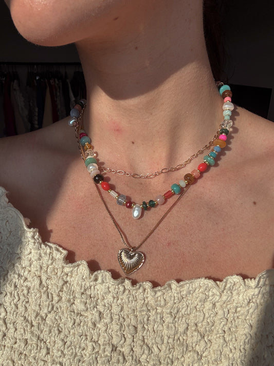 colorful beaded stack necklace with gold heart pendant
