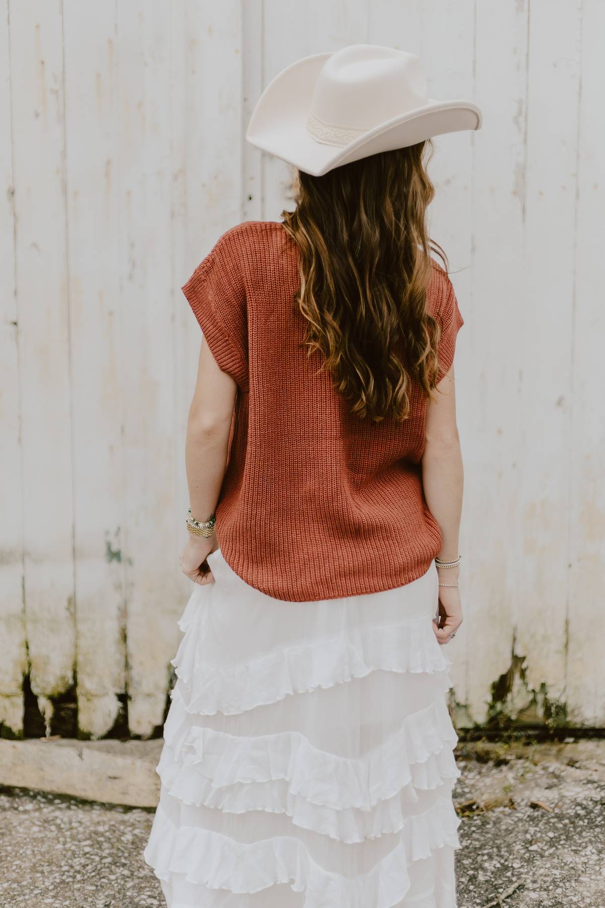 back of horseshoe sleeveless sweater